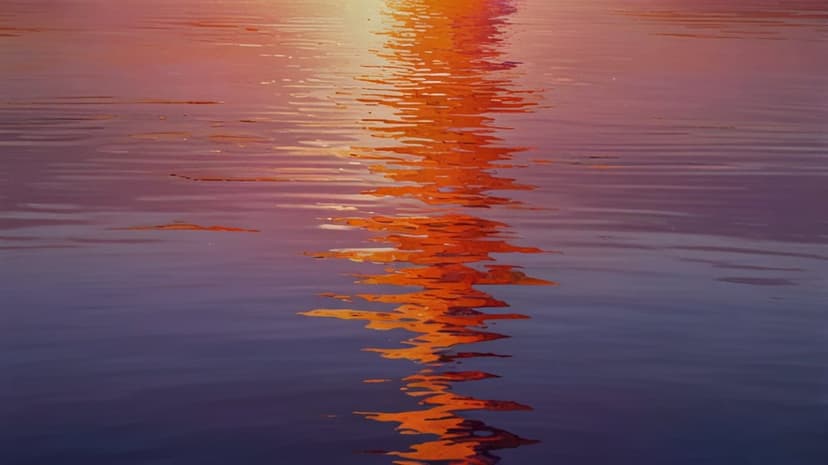 Golden sunbeams glisten over deep purple rippling water surfaces during a tranquil evening sunset.