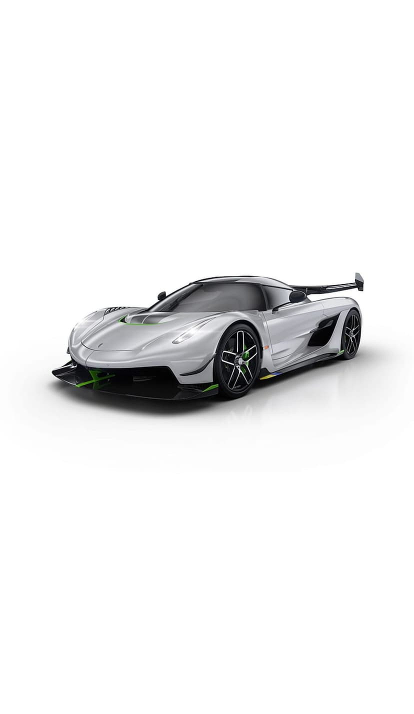 Silver Koenigsegg Jesko hypercar with green trim on its front splitter and wheels against a white background.