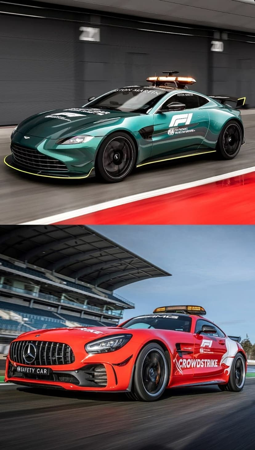 Aston Martin and Mercedes-AMG safety cars driving on a racing circuit with lights flashing on grey asphalt.