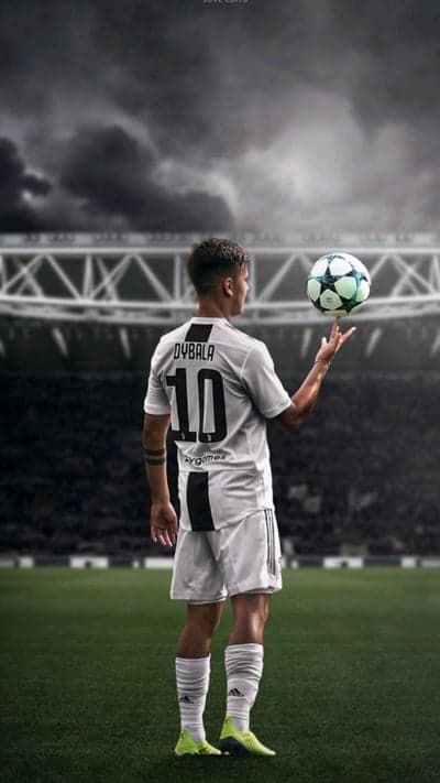 Paulo Dybala spins soccer ball on finger in stadium