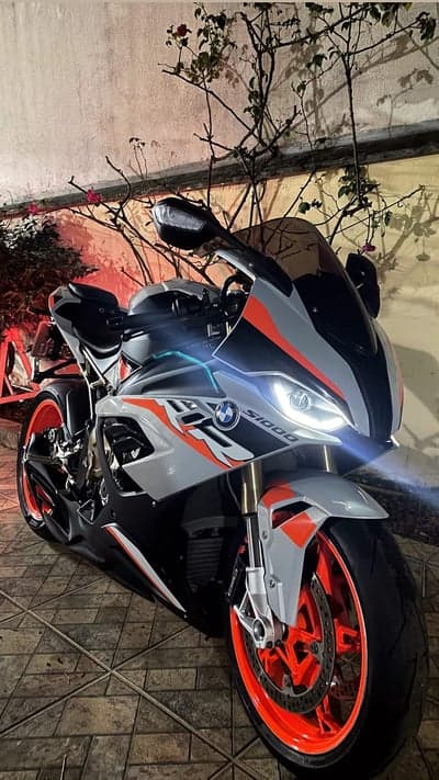 BMW S1000RR Motorcycle with Orange Wheels and Red Accents