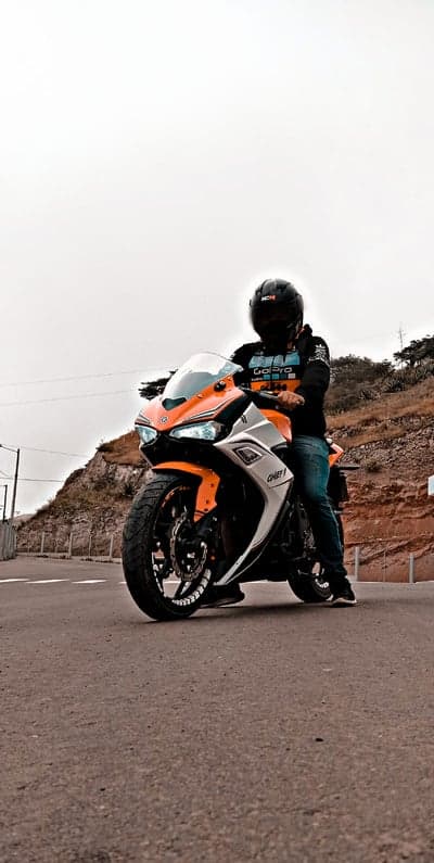 Vibrant Orange Sportbike Biker Mobile Screen Background