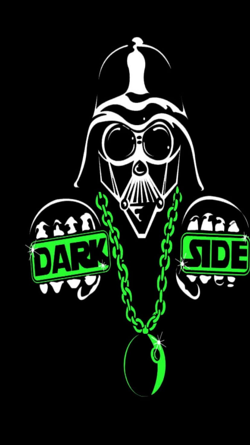 Darth Vader wearing a thick green jewelry chain with plaques reading Dark Side and a circular space station charm.