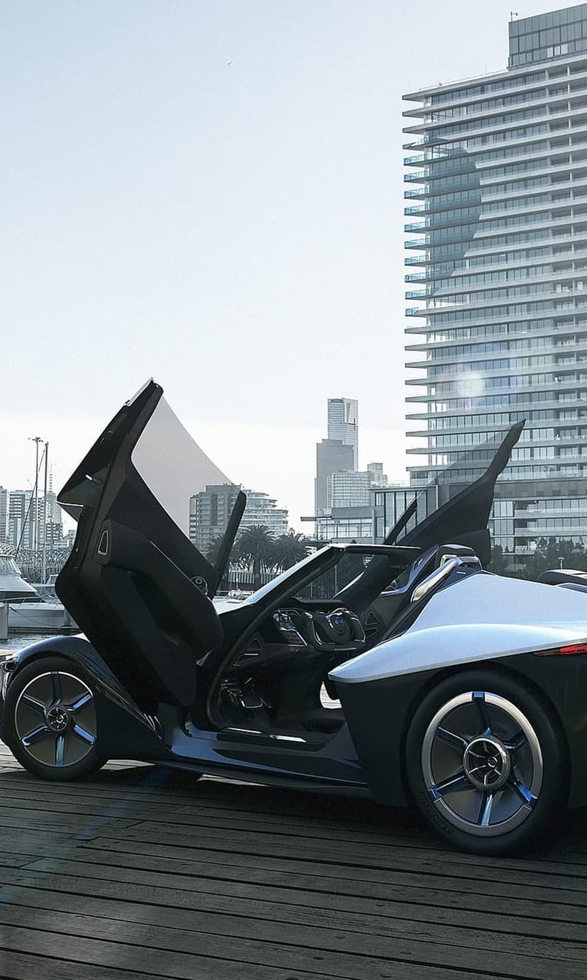 Black and silver concept car with open scissor doors parked on a wooden deck before a tall urban city skyline.