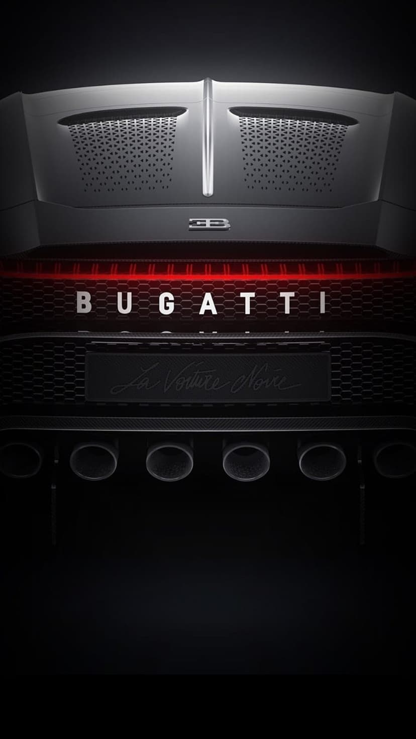 Bugatti La Voiture Noire rear featuring a red LED light bar, central quad exhaust, and silver brand lettering.