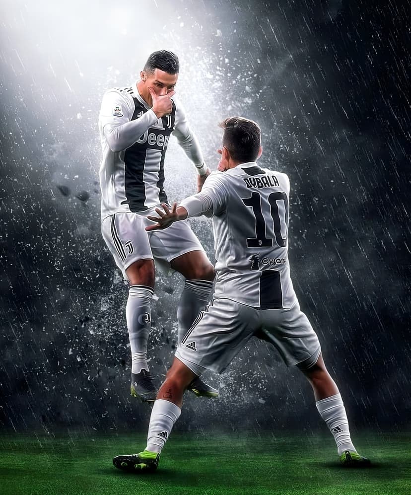 Ronaldo and Dybala celebrate in Juventus jerseys during a heavy rainstorm on a dark, moody football field.