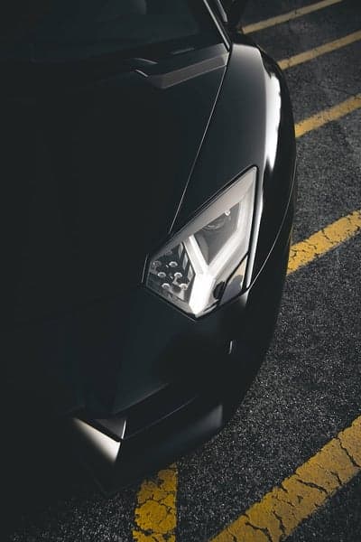 Sleek Lamborghini Aventador LED Headlight Mobile Background