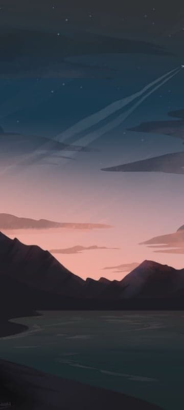 Peaceful mountain lake at sunset with contrails