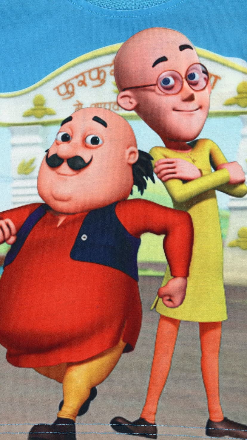 Motu in a red kurta and Patlu wearing yellow standing by a Hindi signpost in a bright animated scene.