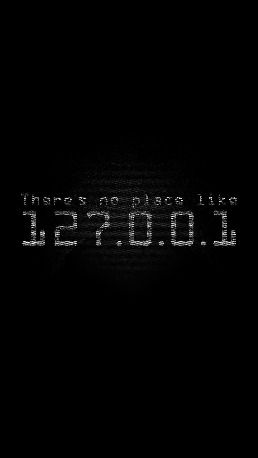White pixelated text reading 'There's no place like 127.0.0.1' centered on a gritty dark gray background.