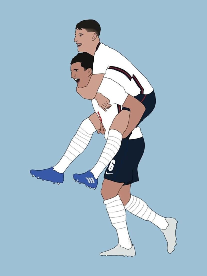 Two male soccer players celebrate with a piggyback ride wearing white jerseys and navy shorts on blue background.