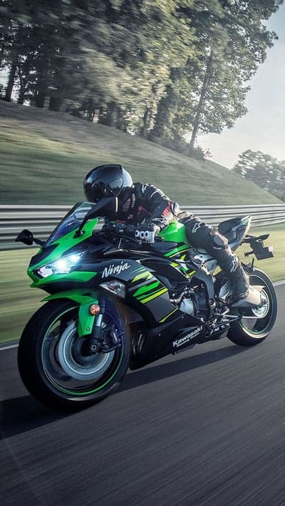 Kawasaki Ninja Motorcycle Speeds Down a Racetrack