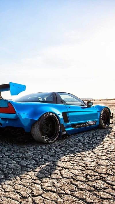 Blue Honda NSX with Widebody Kit on Cracked Earth