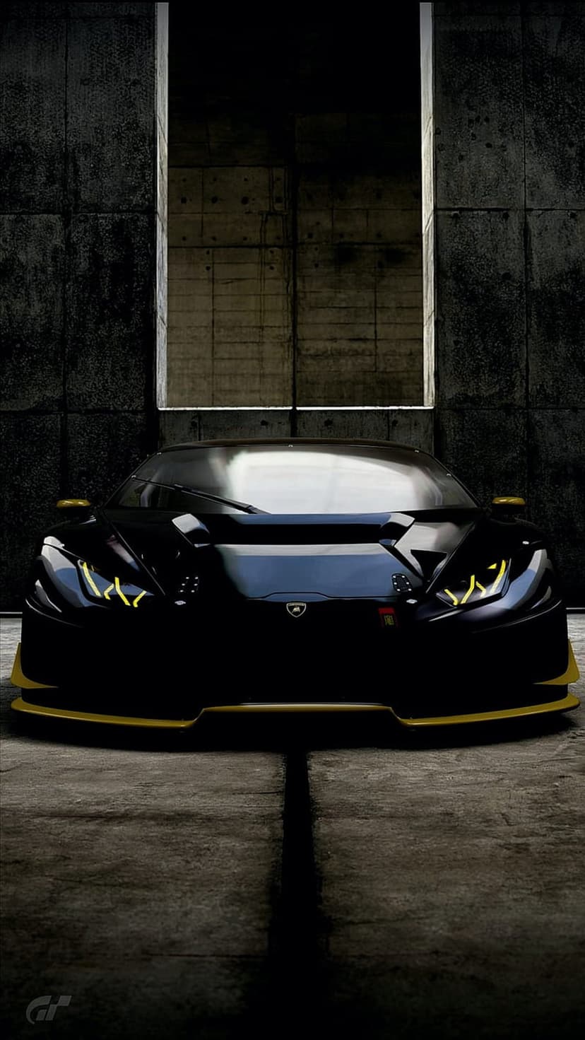 Black Lamborghini supercar with yellow trim parked in a dark industrial space with concrete textures.