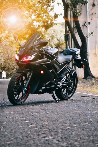 Sleek Black Yamaha Motorcycle on a Sunlit Road