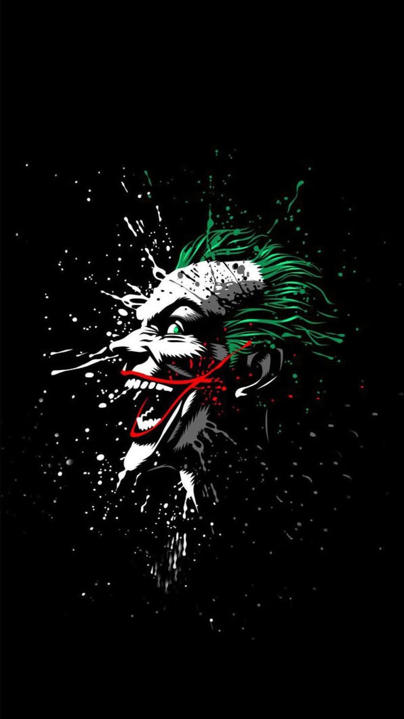 The Joker’s manic red grin and green hair emerge from black and white paint splatters against a dark background.