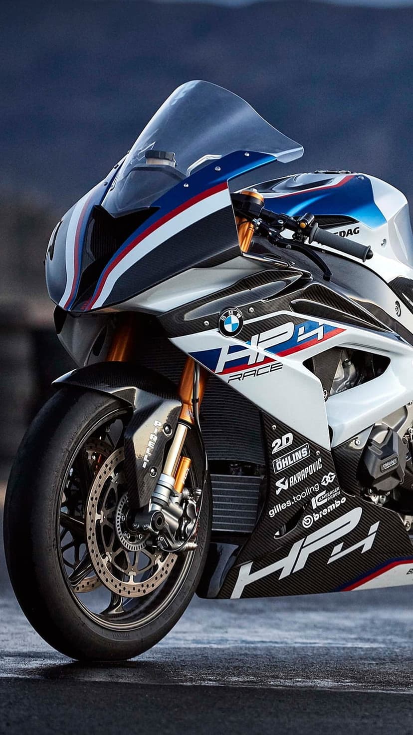 BMW HP4 Race superbike features carbon fiber fairings, M Motorsport livery, and high-performance racing components.