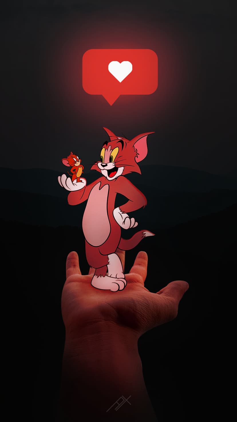 Tom and Jerry sit on an open human palm beneath a glowing red heart icon against dark mountain silhouettes.