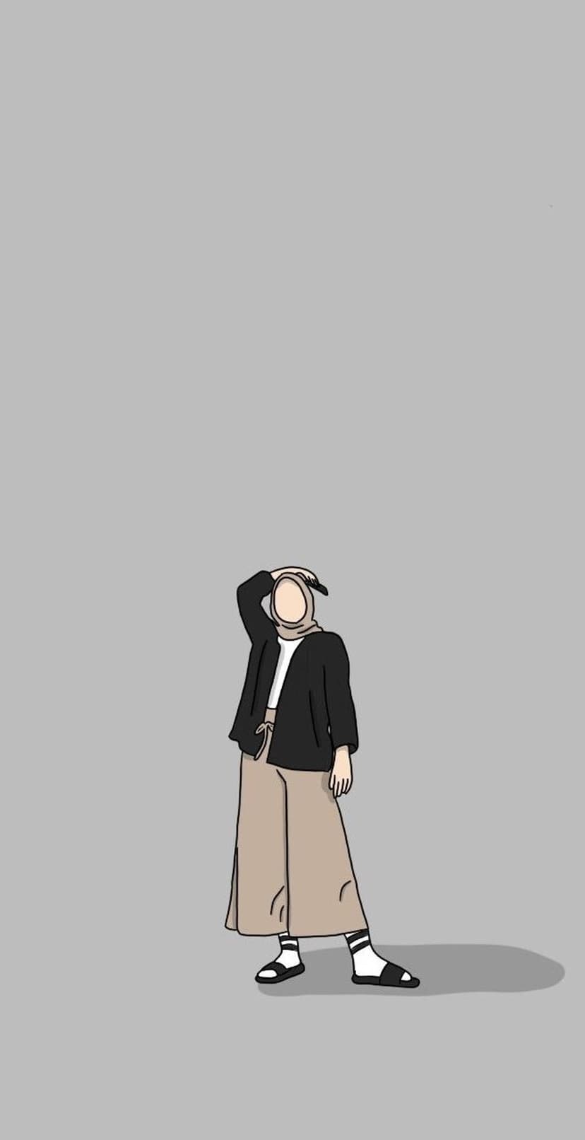 Woman in a black jacket, white top, and beige pants wearing a hijab while posing against a solid grey backdrop.