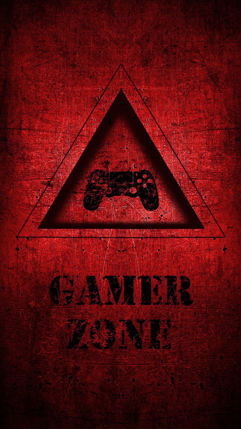 Red warning triangle containing a black video game controller silhouette and gamer zone text on a textured base.