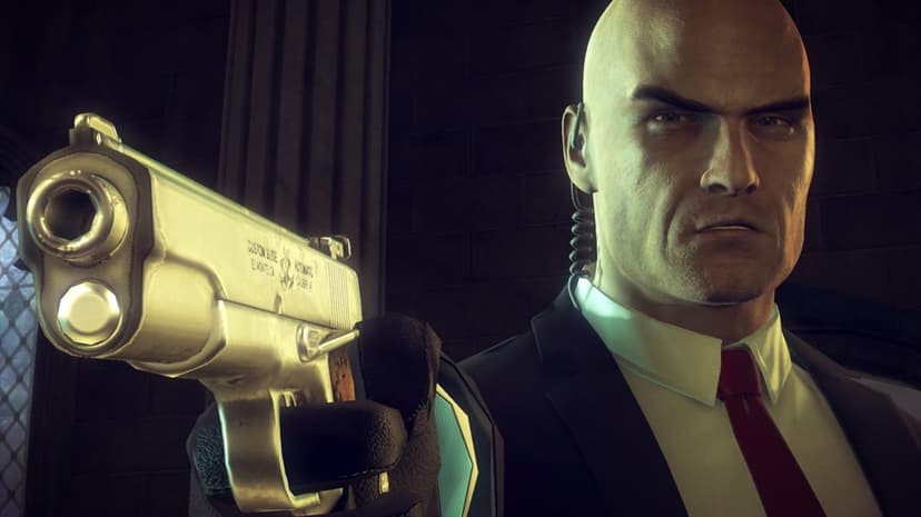 Agent 47 in a black suit aims a silver pistol forward against a dark stone wall and column background.