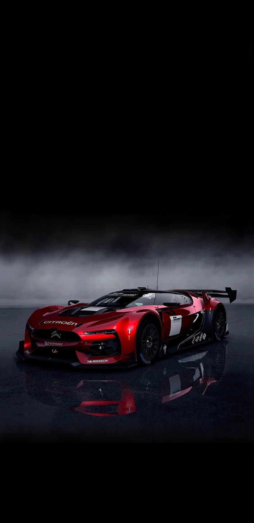 Red Citroën DS3 WRC rally car on a wet reflective surface surrounded by thick white smoke and dark mist.