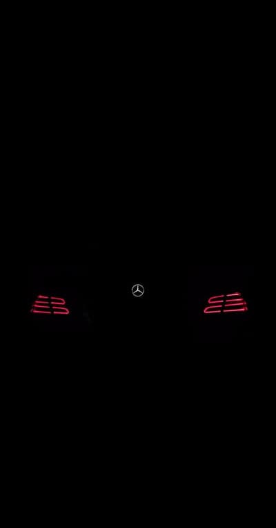 Sleek Mercedes-Benz Night Taillight Phone Background