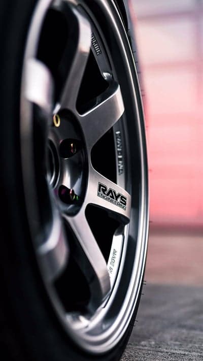 Rays Engineering Wheel Close-Up with Colored Lug Nuts