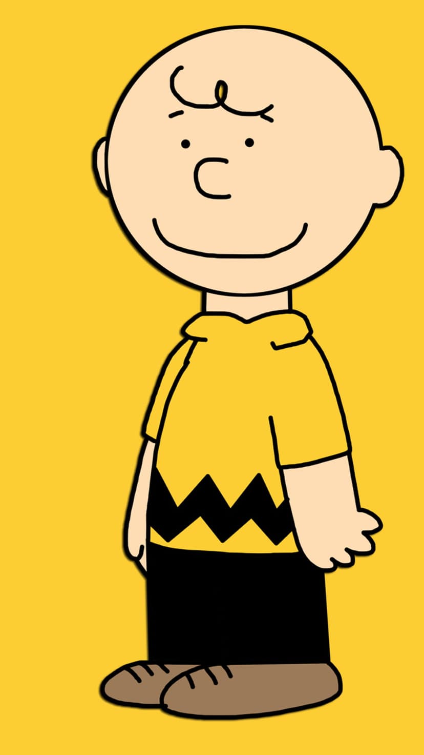 Charlie Brown wearing a yellow shirt with a black zigzag stripe stands against a solid vibrant yellow background.