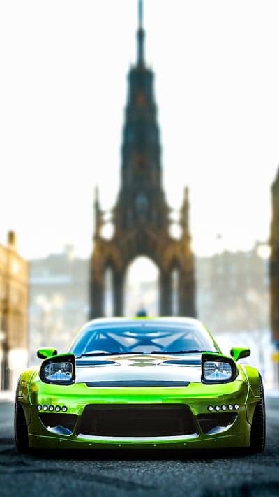 Neon Green Tuner Car and Gothic Monument Phone Wallpaper