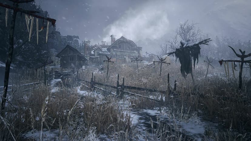 Snowy abandoned village with dark wooden houses and tattered black effigies under a foggy gray winter sky.