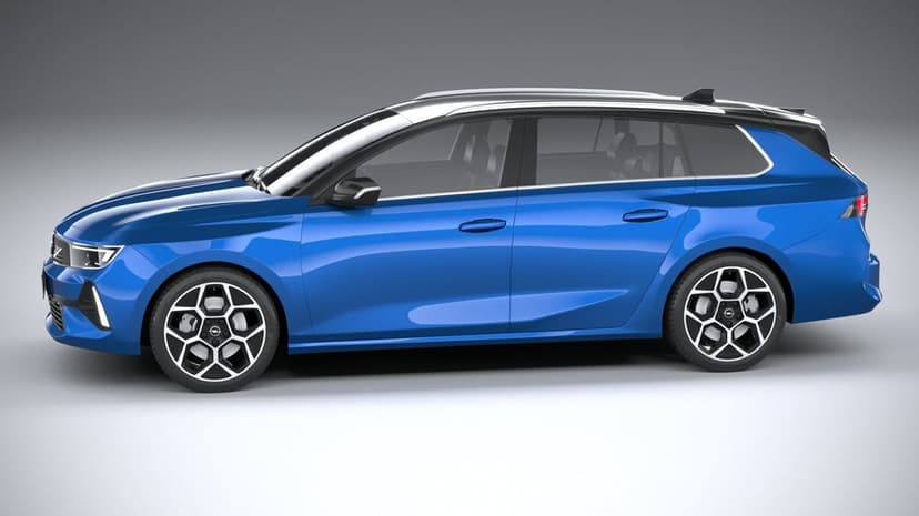 Side profile of a blue Opel Astra Sports Tourer wagon with geometric wheels against a grey studio backdrop.
