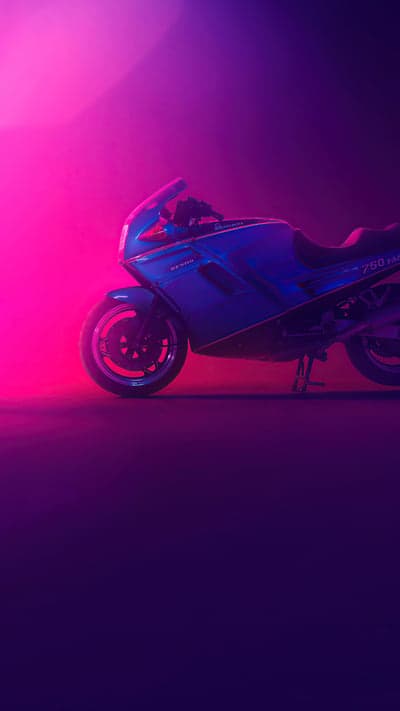 Retro Blue Sportbike in Neon Pink and Purple Lights