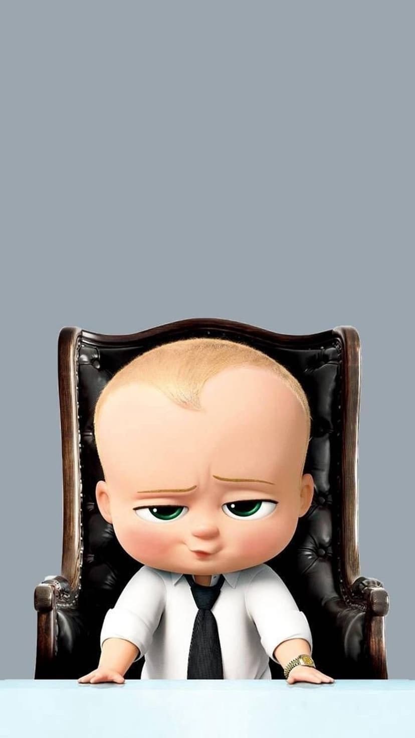 Boss Baby wearing a black tie and gold watch sits in a leather chair with a serious expression and green eyes.