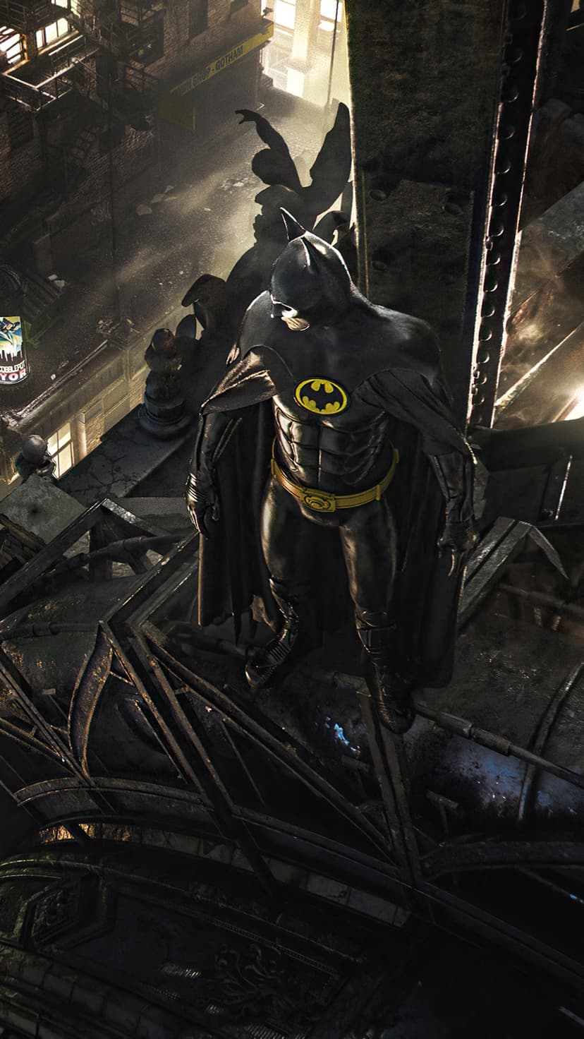 Batman wearing a black and yellow suit stands on a dark industrial rooftop overlooking a distant city skyline.