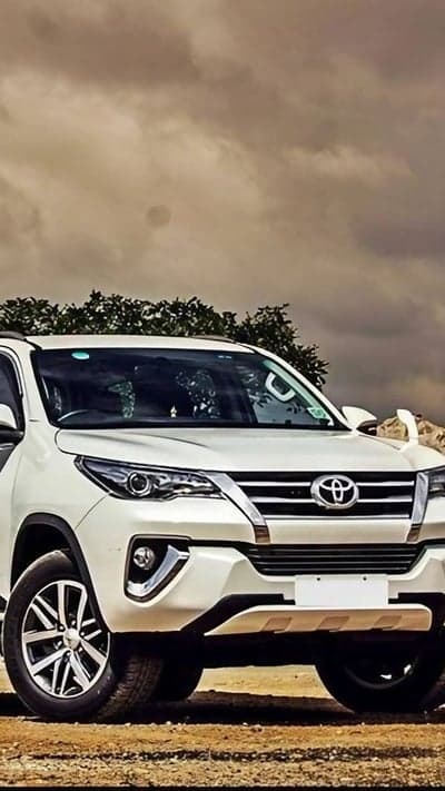 White Toyota Fortuner SUV parked outdoors