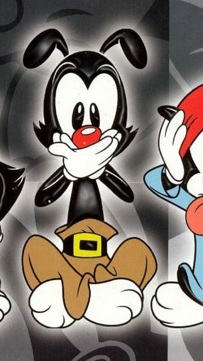 Yakko, Wakko, and Dot Warner with hands over mouths