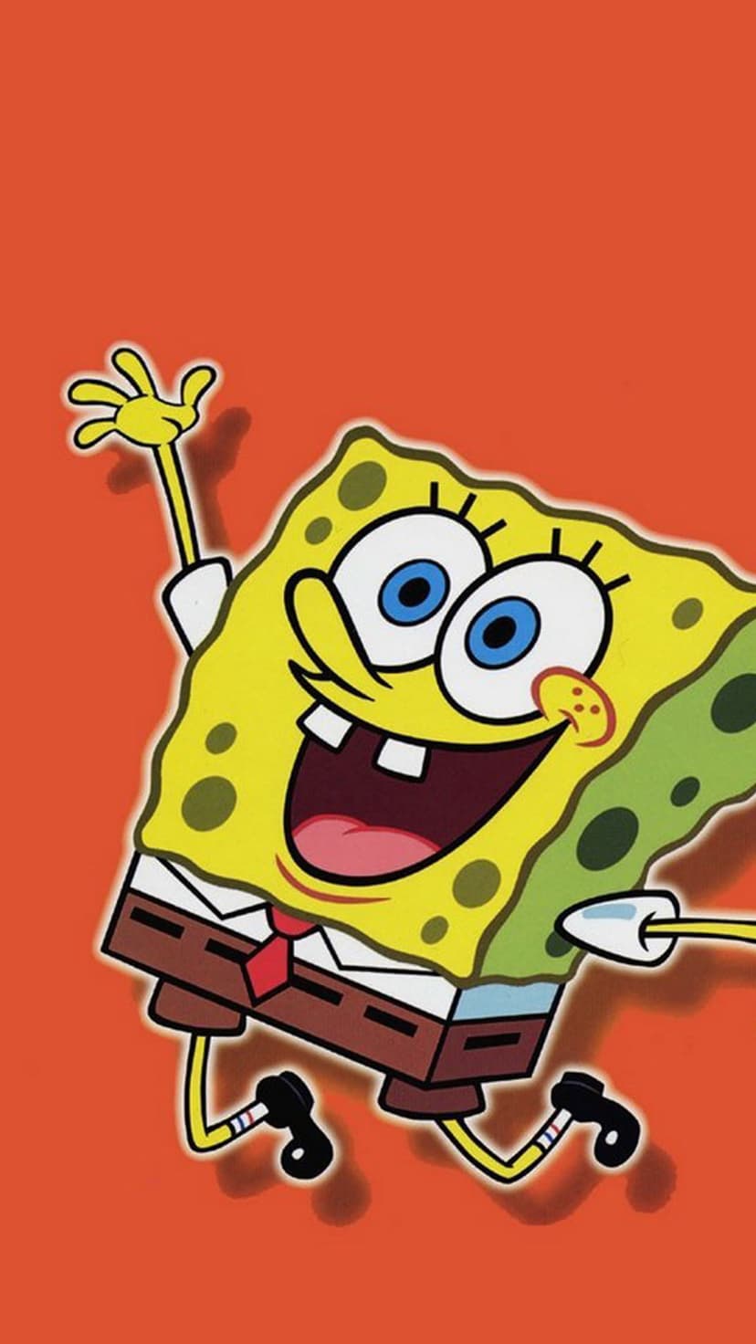SpongeBob SquarePants smiling with wide blue eyes and a red tie against a solid, vibrant orange background.