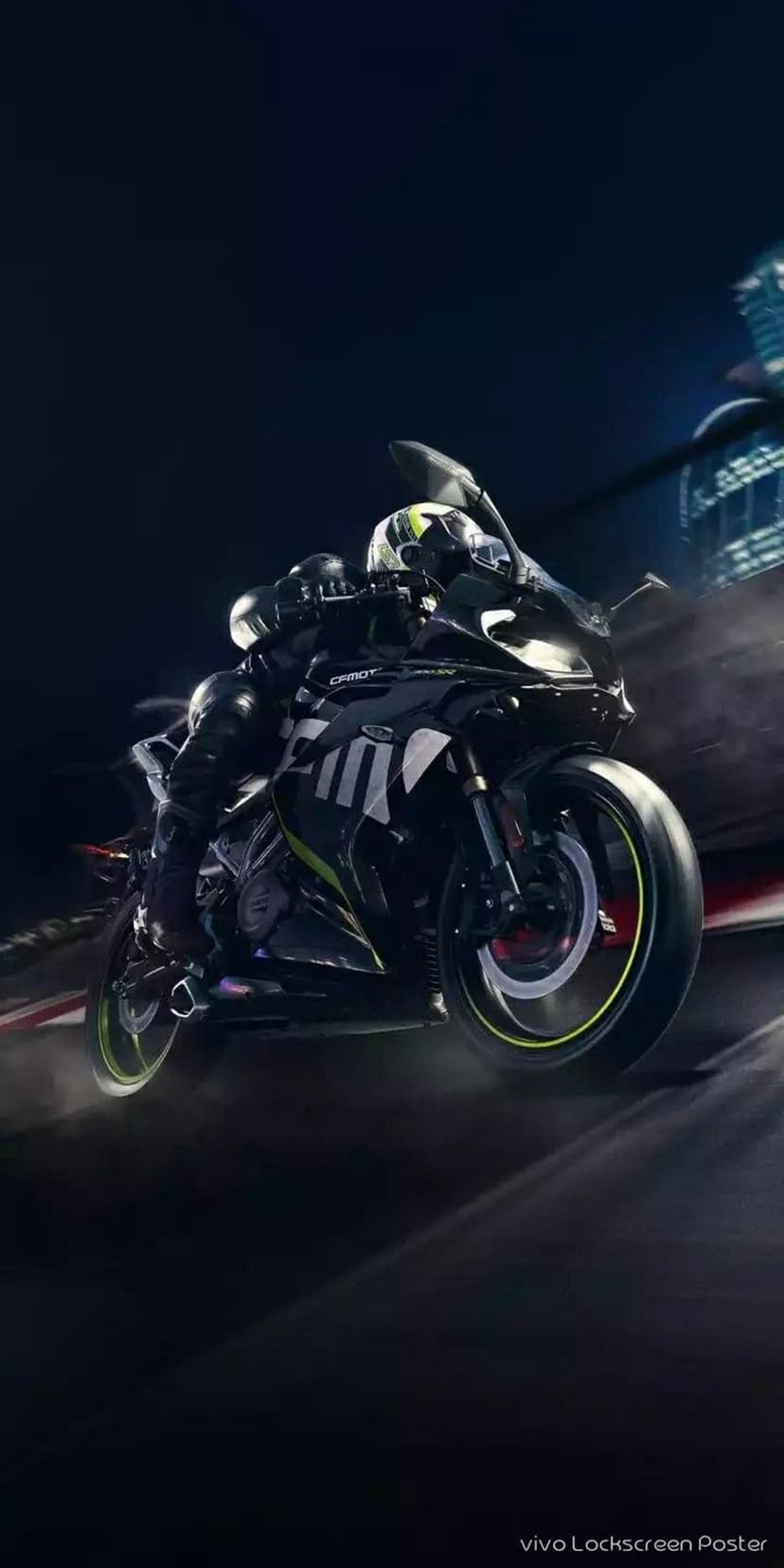 Sportbike rider in neon green accents leans into a fast turn with motion blur and city lights at night.