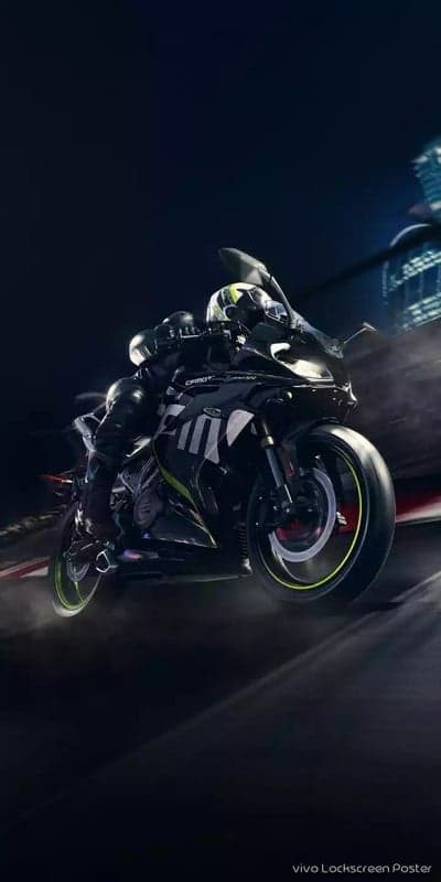 Racer on a sportbike at night, dynamic speed blur