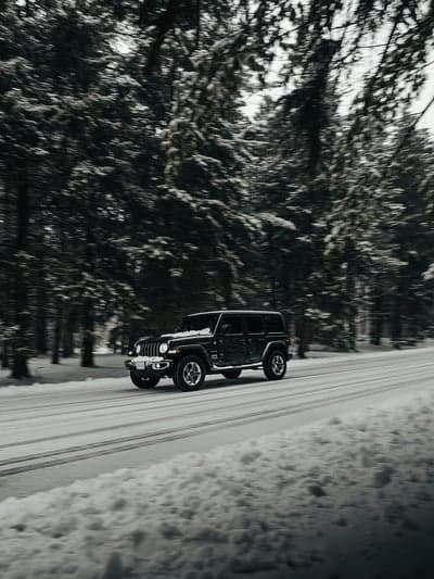 Black Jeep Wrangler Winter Forest Mobile Wallpaper
