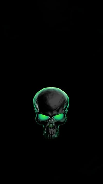 Scary Black Skull with Glowing Green Eyes