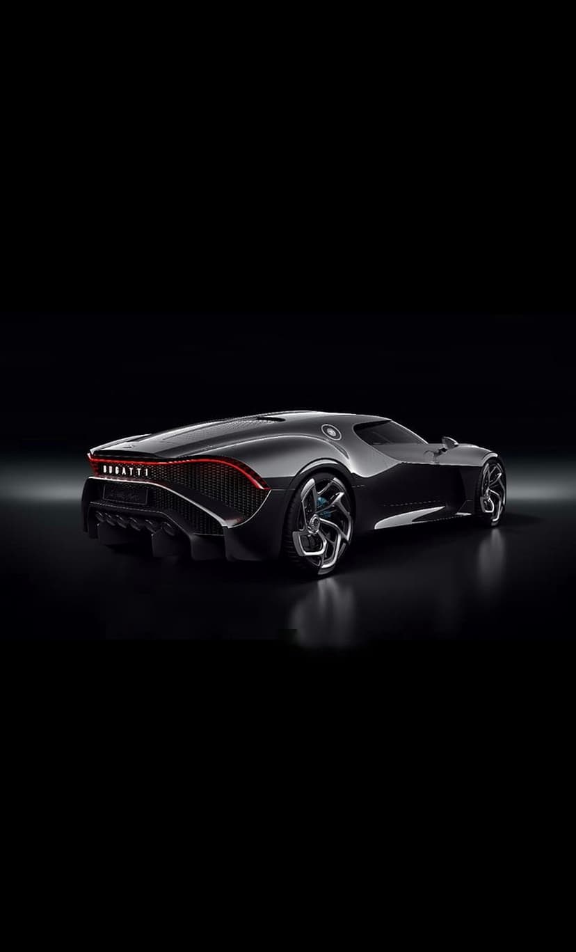 Bugatti La Voiture Noire hypercar featuring obsidian carbon fiber bodywork and distinctive rear light signature.