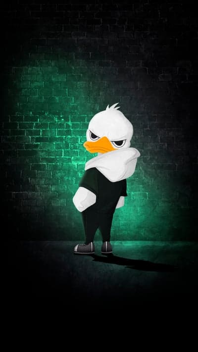 Angry Duck in Black Hoodie Green Brick Wall Phone Wallpaper