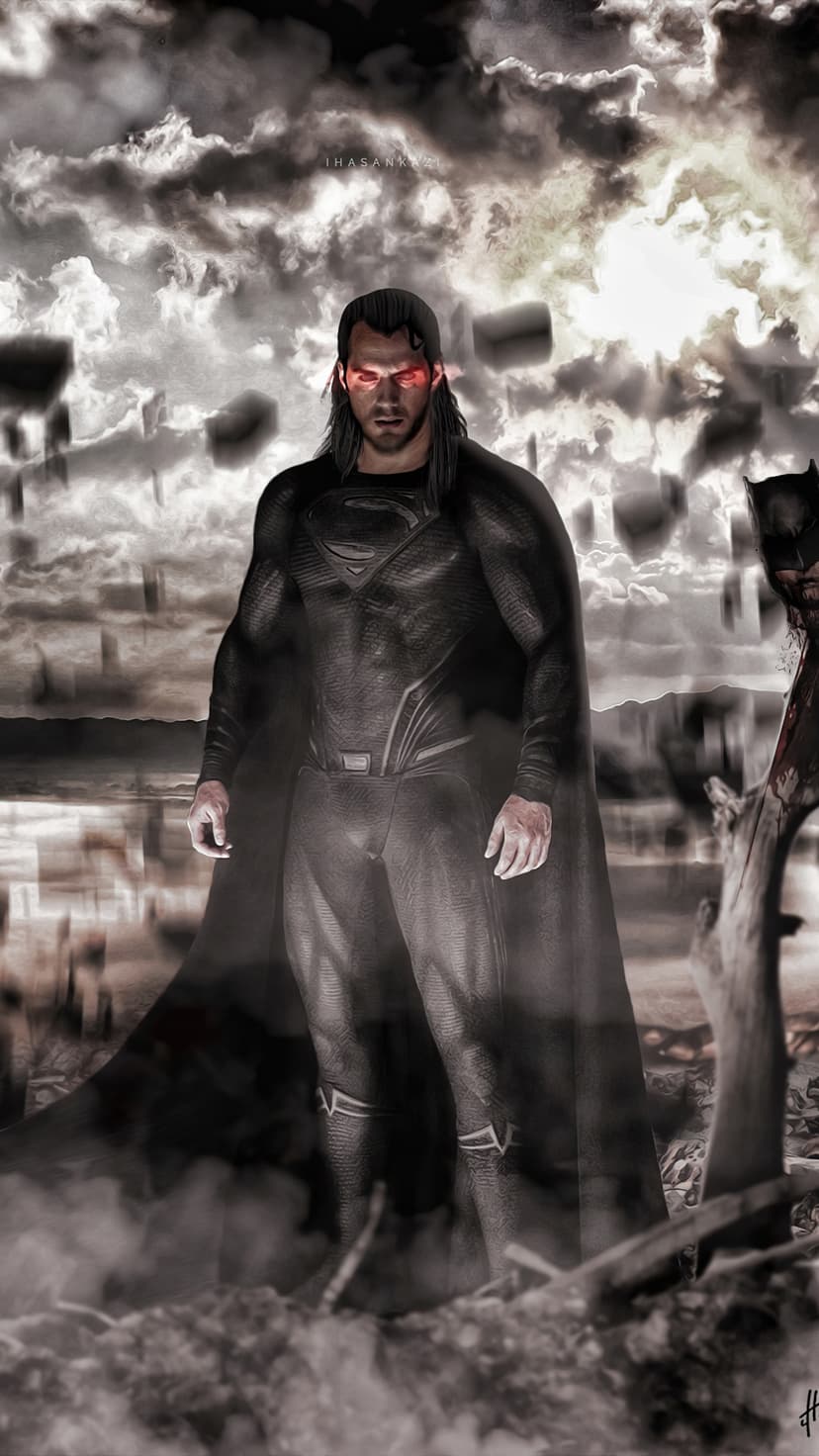Superman with glowing red eyes wearing a black suit stands amidst an apocalyptic storm with floating debris.