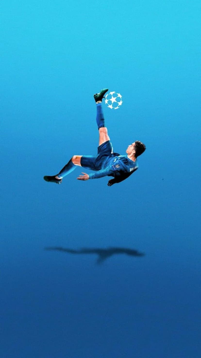 Athlete in a blue uniform executes a mid-air overhead kick with a soccer ball against a vibrant azure sky.