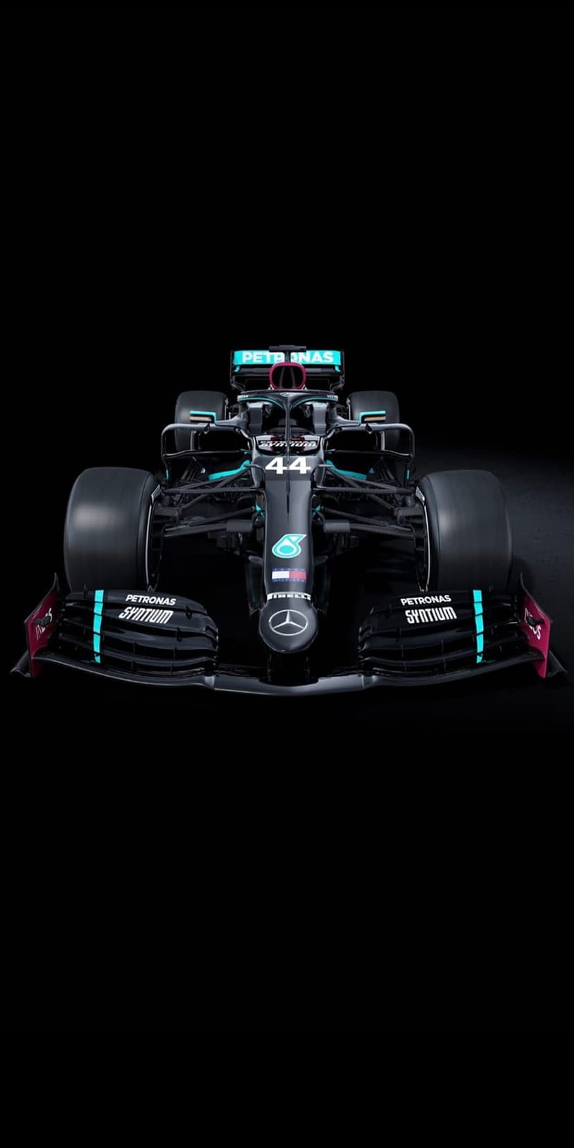 Mercedes-AMG F1 W12 car with teal accents and a wide front wing positioned against a dark black background.