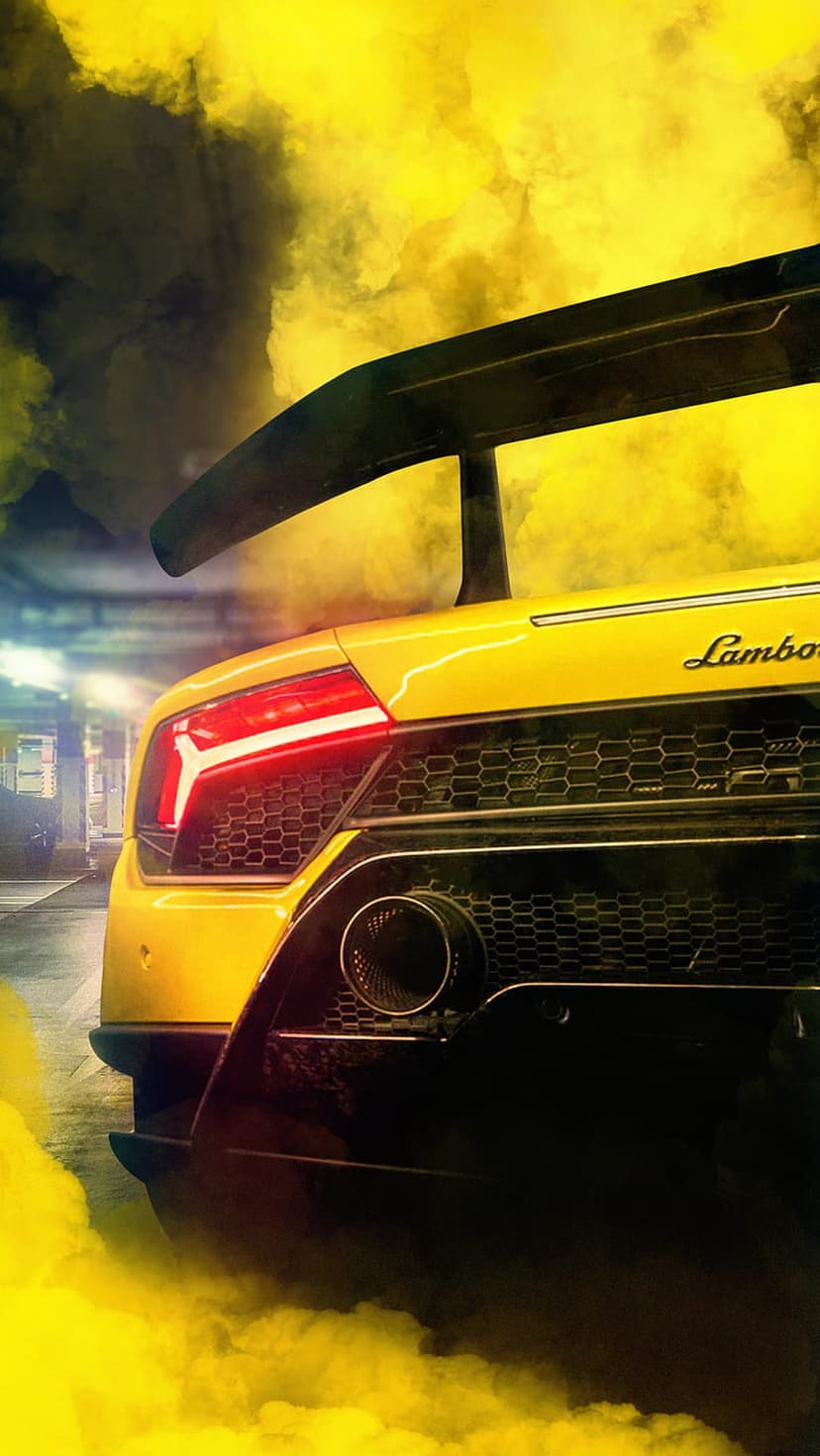 Yellow Lamborghini Aventador rear with glowing taillights and thick yellow smoke for a mobile background.