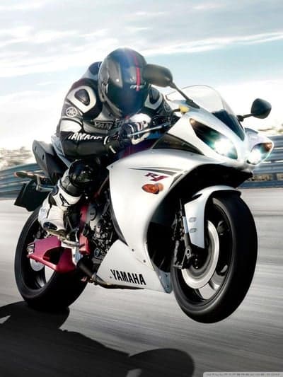 Yamaha R1 Motorcycle Rider Leaning into a Turn