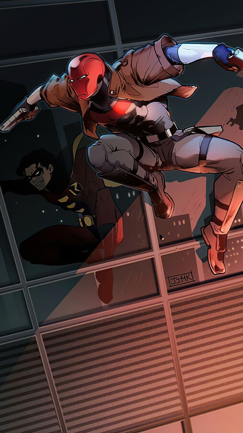 Red Hood leaps through the night air while Robin crouches on a building ledge against a glowing city backdrop.